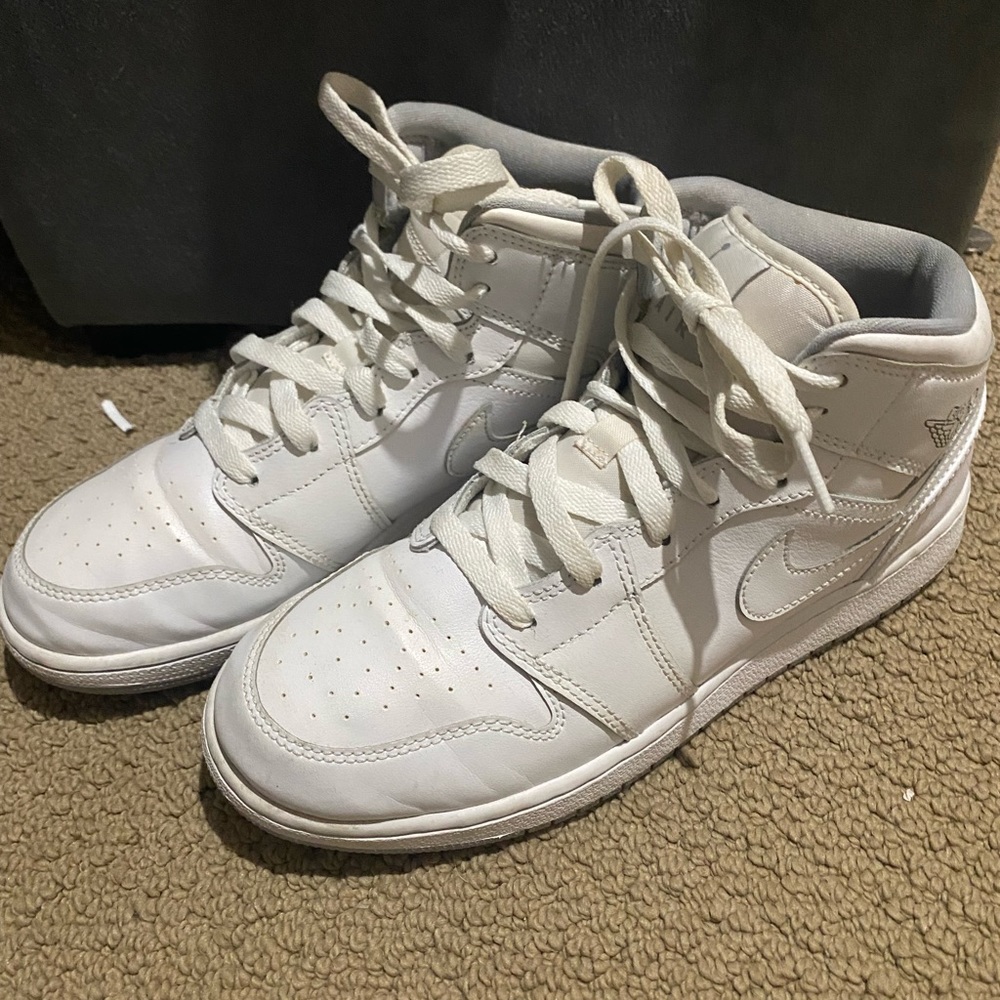 Air 1 Jordan mids white. Can fit woman’s size 9